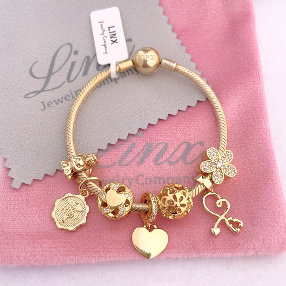 Linx Yellow Gold Snake Chain Bracelet with Registered Nurse Themed Charms - Picture 8 of 14